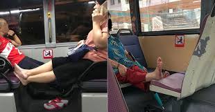 Image result for wheelchair man singapore feet up smrt gif