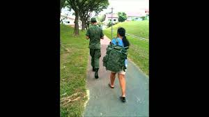 Image result for maids carry back pack singapore nsmen