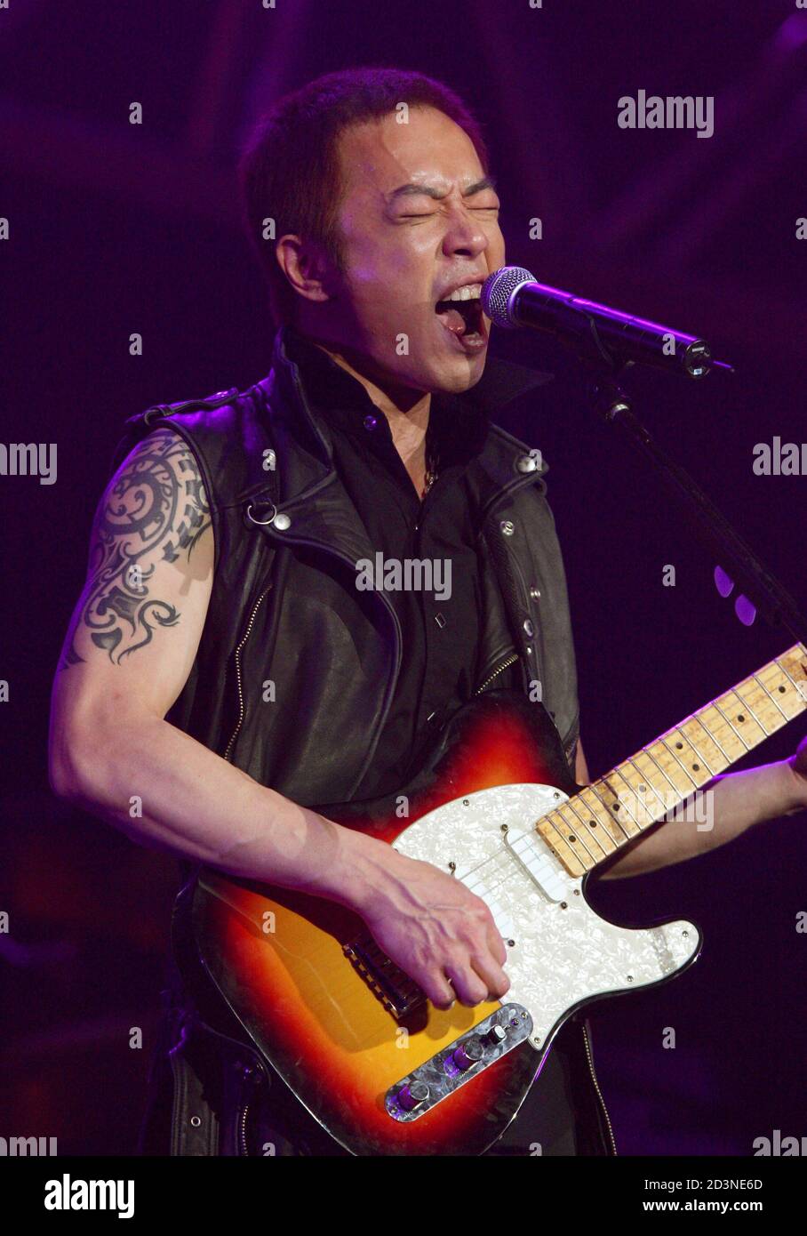 hong-kong-soul-rock-band-beyond-bassist-paul-wong-performs-at-the-bands-farewell-concert-in-ho...jpg