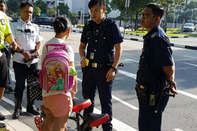 Police impound e-scooter after Singapore mum rides on road with kid_1.png