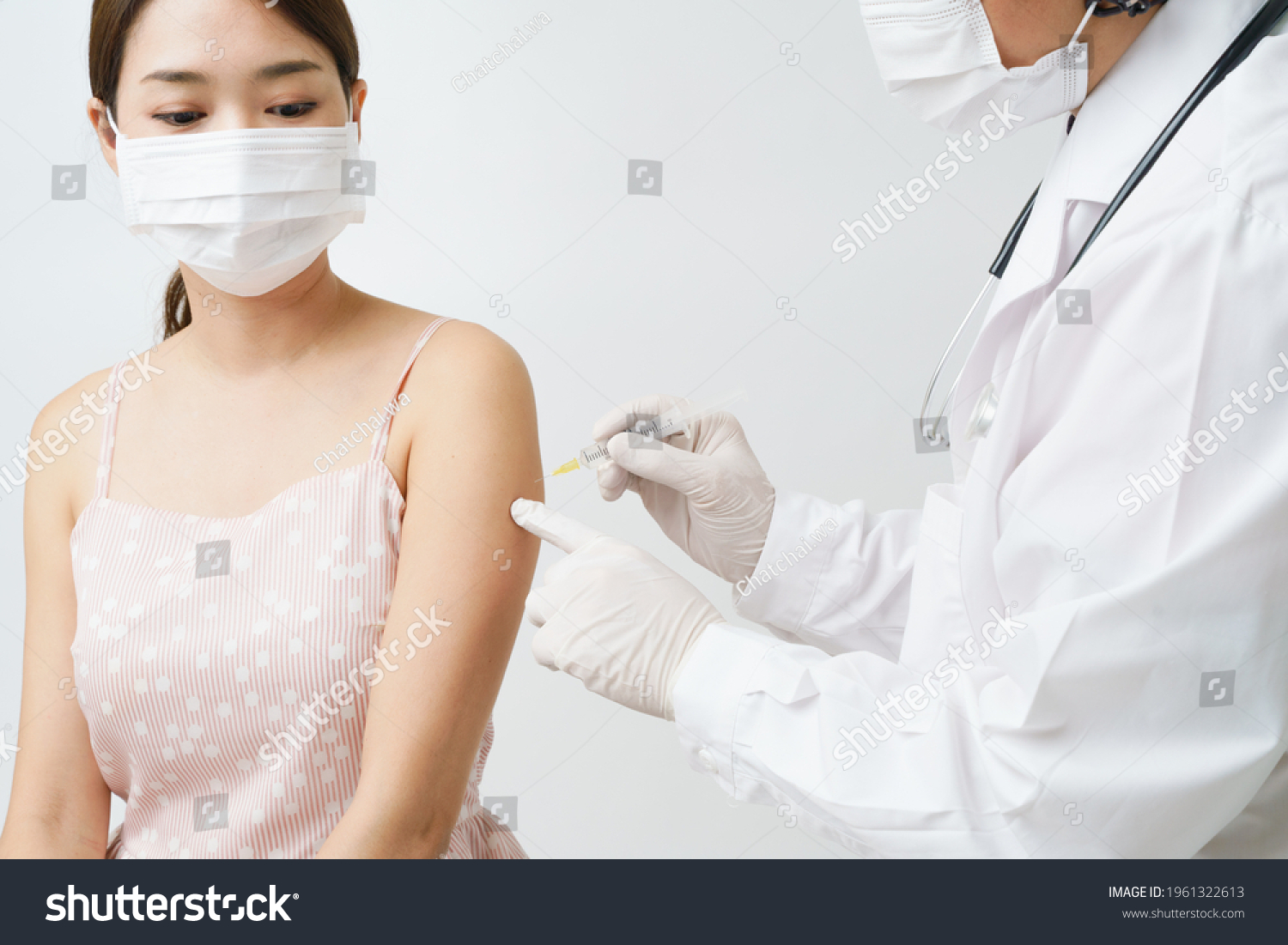 stock-photo-professional-doctor-or-nurse-use-syringe-inject-vaccine-for-patient-woman-in-prote...jpg